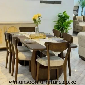 6 seater Muninga wood dining set with upholstered chairs for modern homes in Kenya.