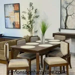 6 seater brown dining set with rectangular table and six neutral upholstered chairs in a modern dining room