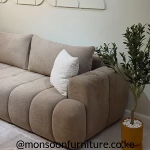 Beige boucle 3 seater curved sofa for modern living rooms in Kenya