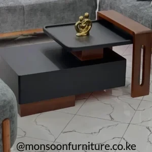 Black and brown layered centre table with raised black upper surface, low black base and slotted brown side accent