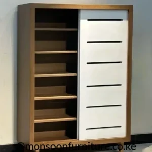 rown and white tall shoe cabinet with open shelves on the left and a white front panel with six horizontal ventilation slots.
