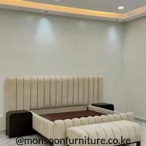 Cream channel tufted upholstered bed with tall padded headboard for modern bedrooms in Kenya