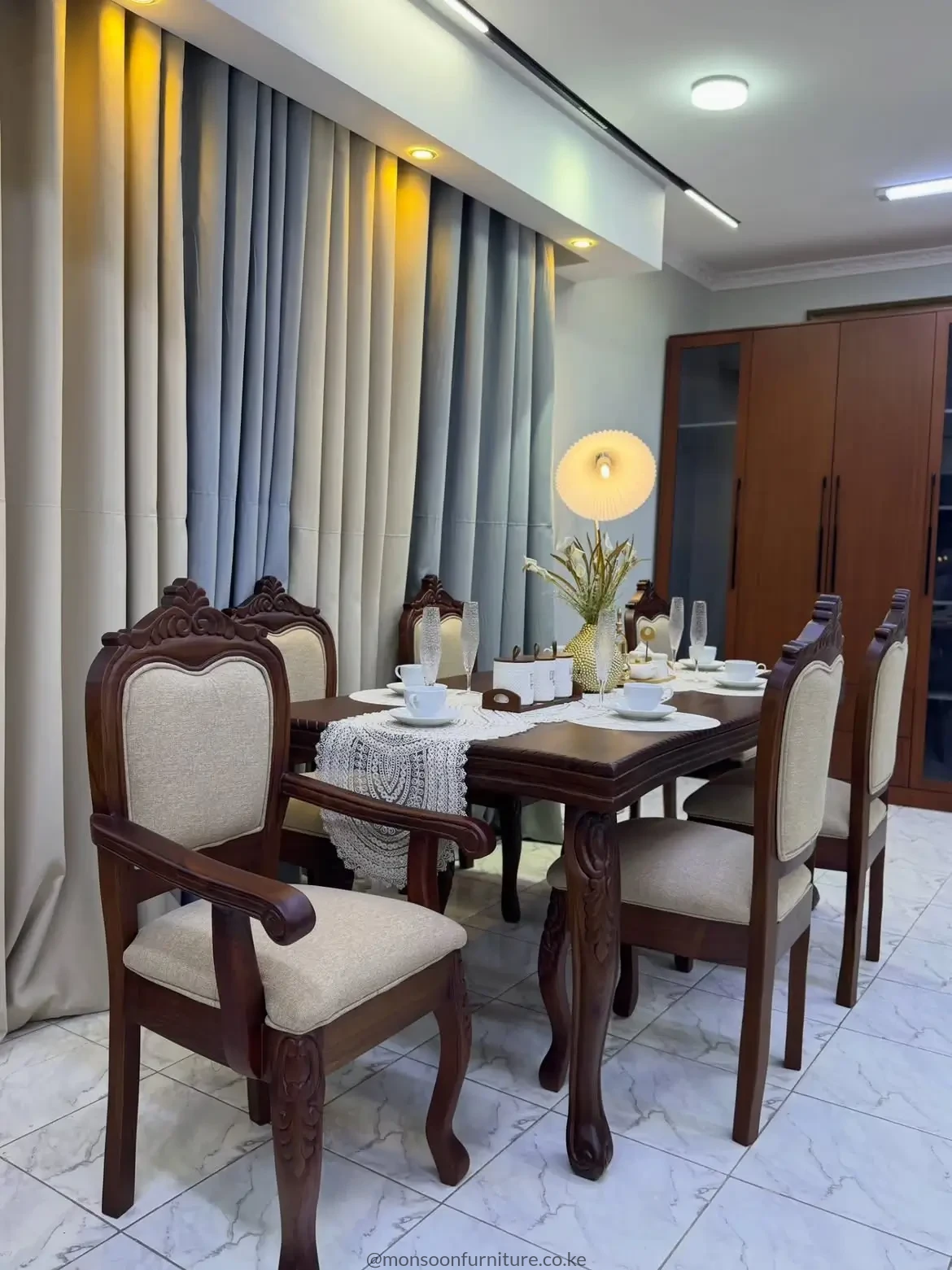 Dark walnut 6 seater carved wooden dining set with upholstered chairs in Kenya