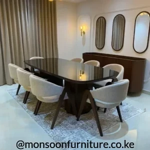 Dark walnut high gloss 8 seater dining table with cream upholstered chairs in Kenya