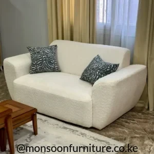 Ivory bouclé 2 seater lounge sofa with deep seating for modern living rooms in Kenya.