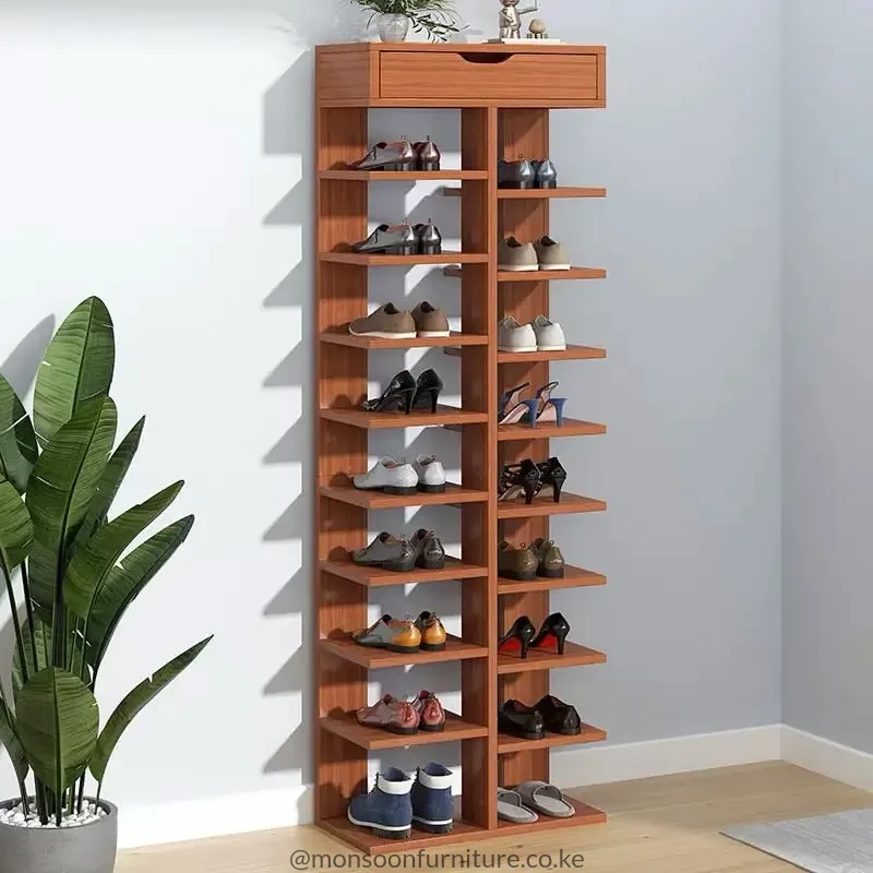 Tall brown open shoe rack with two columns of multiple shelves, a full-width top drawer and footwear displayed on each side.