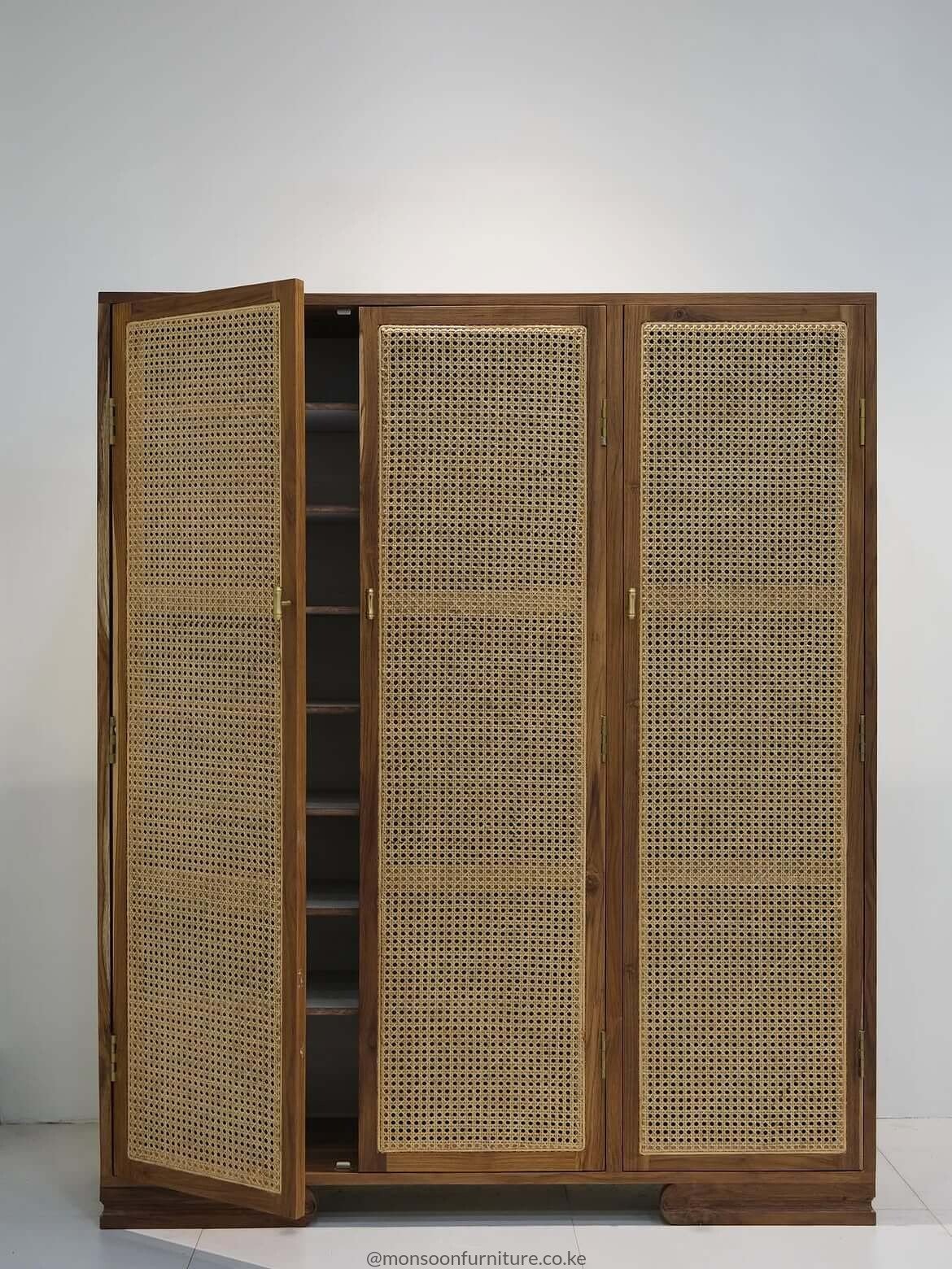 Shoe cabinet with a door open revealing several internal shelf levels for shoes