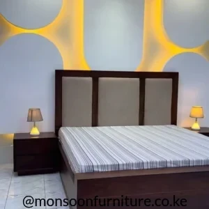 Walnut three-panel upholstered platform bed with modern headboard in Kenya