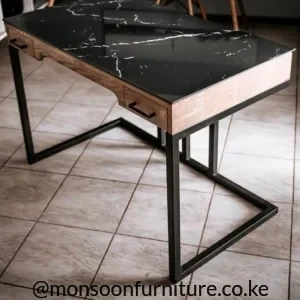 Black stone-top work desk with white veining, wood drawer fronts and black open-frame legs