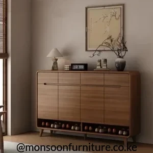 Warm brown closed shoe cabinet with five shallow top drawers, lower doors, an open shoe shelf and raised tapered legs.