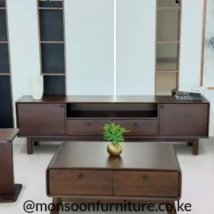 Dark walnut-look TV console and matching rounded drawer coffee table set for a modern living room in Kenya.