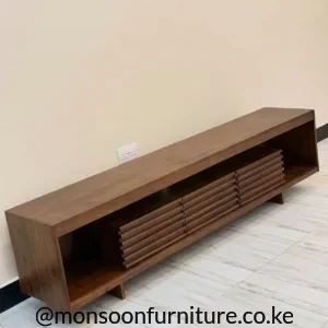 Dark brown wood-tone media console with ribbed centre front and open side bays