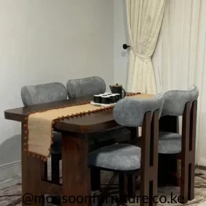 4 seater dining set with dark brown rectangular table and grey upholstered chairs in a dining room