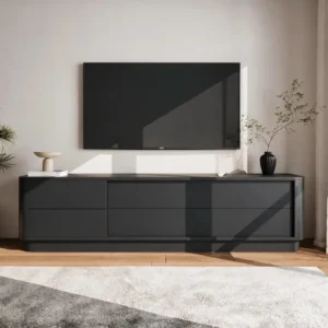 Dark grey low-profile entertainment unit with six drawer fronts in a modern living room