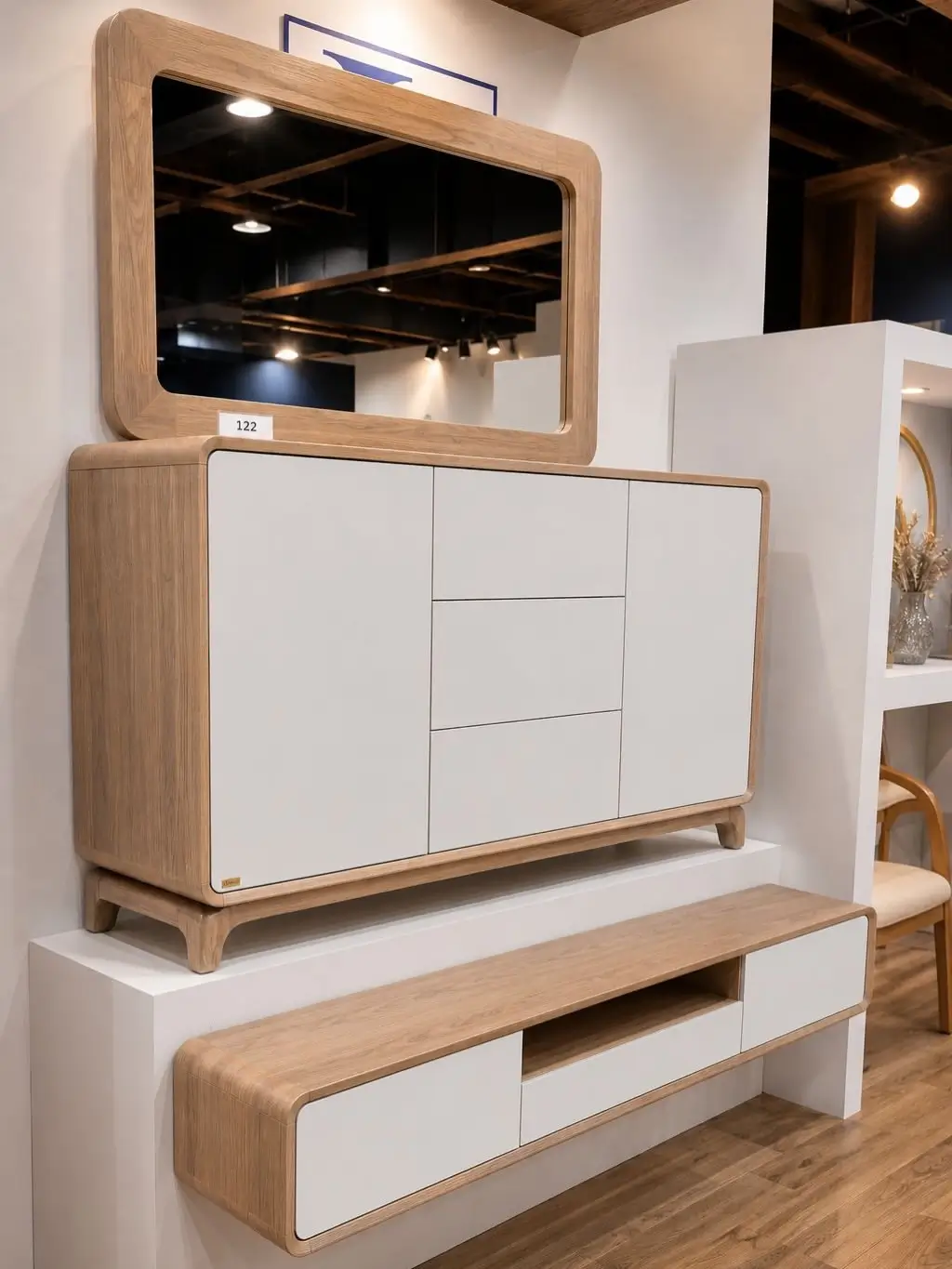 Light wood-tone and white TV cabinet with rounded corners, closed storage and central open shelf