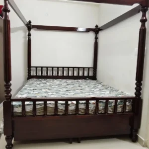Mango wood four poster bed with tall turned posts, overhead rails and dark-brown finish