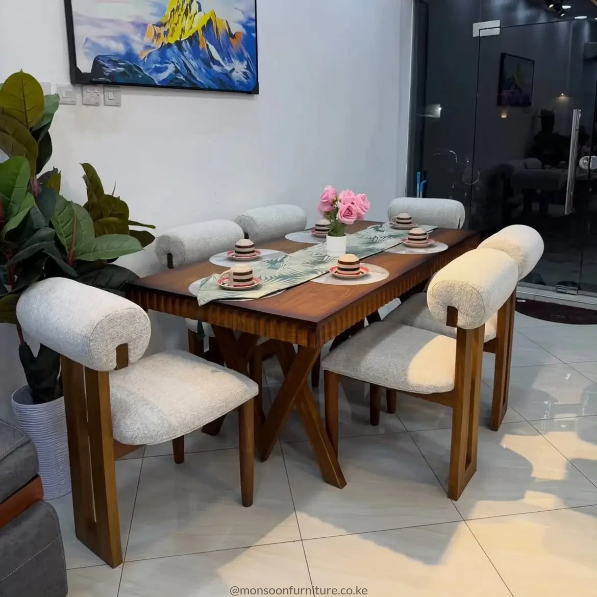 Modern walnut 6 seater sculptural dining set with upholstered barrel-back chairs in Kenya