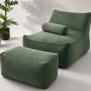 Olive green ribbed lounge accent chair with matching rectangular ottoman and cylindrical bolster cushion