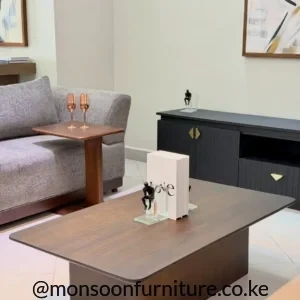 Rounded corner solid Muninga wood coffee table with pedestal base Kenya