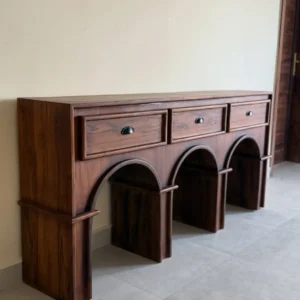 Luxury brown console table with three drawers and triple-arch front