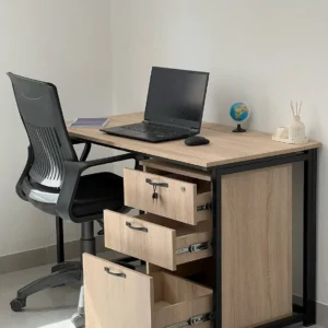 Light wood-look office desk with three drawers and black office chair