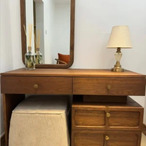 Brown Aldergate wooden dressing table with rounded rectangular mirror and four drawers