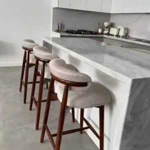 Aldrich wooden bar stool with cream upholstered curved back and seat