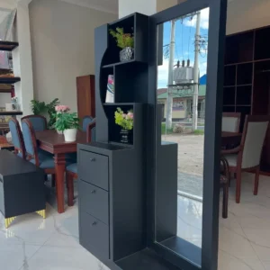 Black wooden Ashstone dressing table with tall mirror, three drawers and open shelves