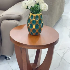 Aspenbourne round mahogany side table with sculptural wooden base