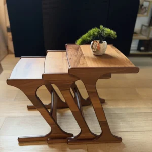 Bayvale three-piece wooden nesting side tables in brown