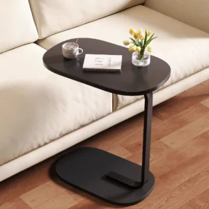 Bluehill black 60cm wooden C-shape side table beside cream sofa