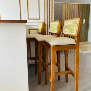 Braemar rattan bar stool with cream upholstered seat and woven back