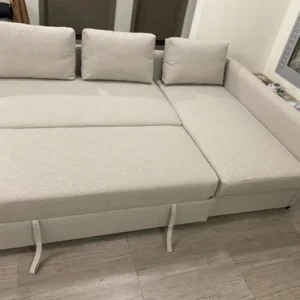 Cream sofa bed shown in sofa mode, open 5x6 bed mode and with storage compartment open