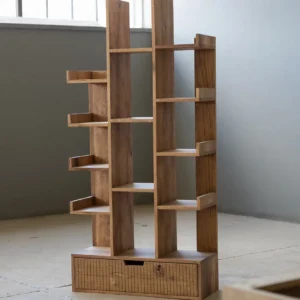 Branton Mvule wood bookshelf with asymmetric open shelves and lower drawer