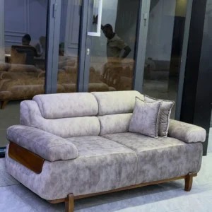 Monsoon Pineford light grey sofa with padded arms and warm wood accents