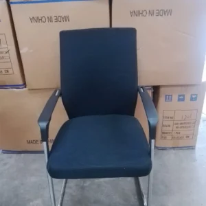 Slim black mesh visitor office chair with fixed armrests