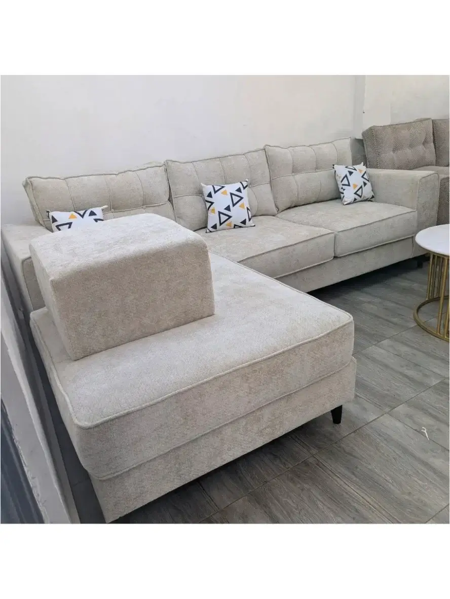 Beige 9ft by 6ft L-shape sofa with broad chaise Kenya