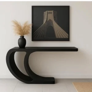 Black sculptural console table with double curved base in Kenya