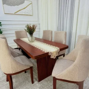Brown 6 seater dining set with fluted base and upholstered chairs