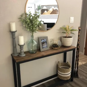Brown-top console table with black open frame in Kenya