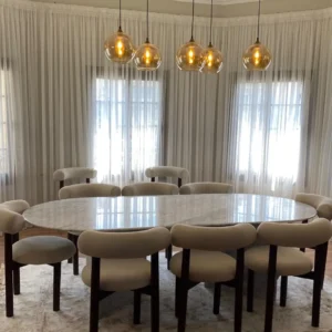 8 seater cream marble dining table with padded cream chairs