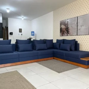 Light neutral sofa set with exposed warm wood-tone frame and cushioned seating