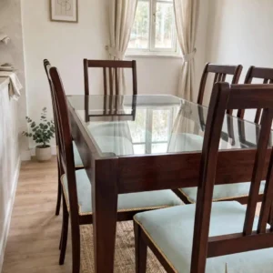 6 seater glass dining set with high-back upholstered chairs in Kenya