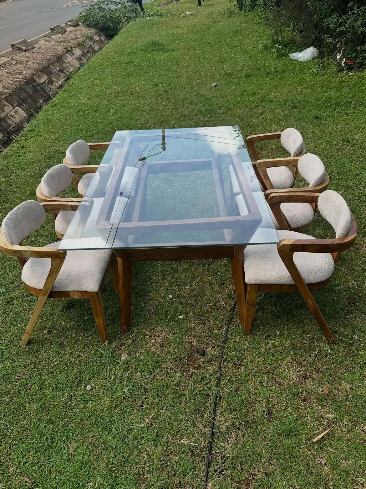 6 seater glass-top dining set with upholstered armchairs in Kenya
