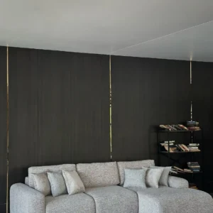 Light grey sectional sofa with right-side chaise and rounded arms