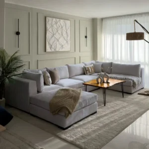 Light grey fabric corner sectional sofa with deep seats and loose cushions