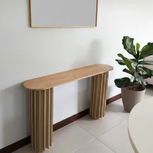 Light wood-look slatted console table with rounded ends in Kenya
