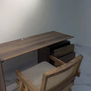 Mahogany office desk with drawers and matching woven-back chair in warm brown wood finish