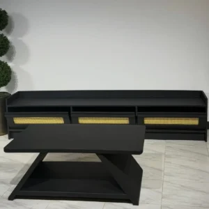 Black TV cabinet with three light woven-style front panels and matching geometric coffee table