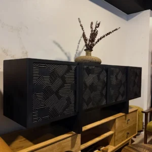 Black Meru Oak TV stand with carved geometric cabinet fronts